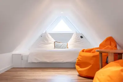 Ein Bett oder Betten in einem Zimmer der Unterkunft Tom's Hof Ferienwhg Alex