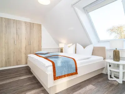 Ein Bett oder Betten in einem Zimmer der Unterkunft Tom's Hof Ferienwhg Inga