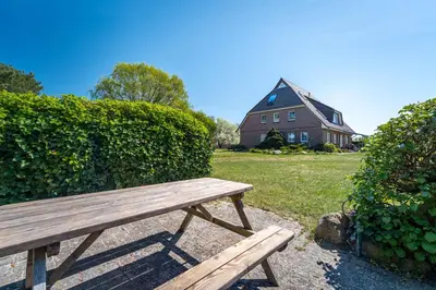 Ein Garten an der Unterkunft Tom's Hof Ferienwhg Inga