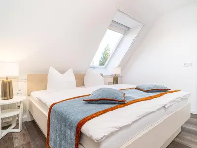 Ein Bett oder Betten in einem Zimmer der Unterkunft Tom's Hof Ferienwhg Inga