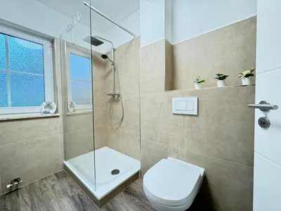 Ein Badezimmer in der Unterkunft Haus Ostseewelle