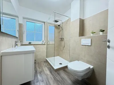 Ein Badezimmer in der Unterkunft Haus Ostseewelle