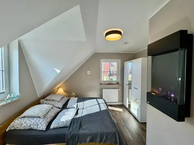 Ein Bett oder Betten in einem Zimmer der Unterkunft Haus Vier-Jahreszeiten