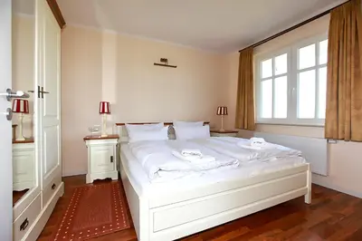 Ein Bett oder Betten in einem Zimmer der Unterkunft Apartment Saatmann Komfort 1