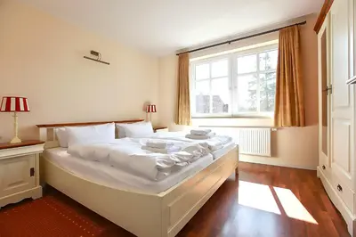 Ein Bett oder Betten in einem Zimmer der Unterkunft Apartment Saatmann Komfort 7
