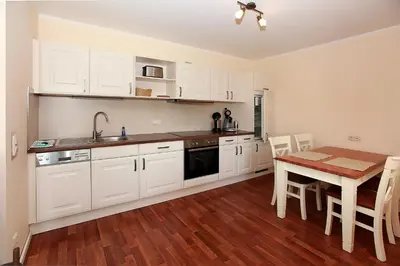 Küche/Küchenzeile in der Unterkunft Apartment Saatmann Suite 9