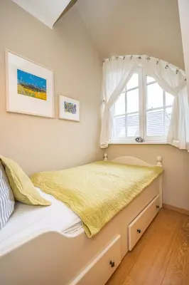 Ein Bett oder Betten in einem Zimmer der Unterkunft Müggenburger Weg 38 Haus Küselwind
