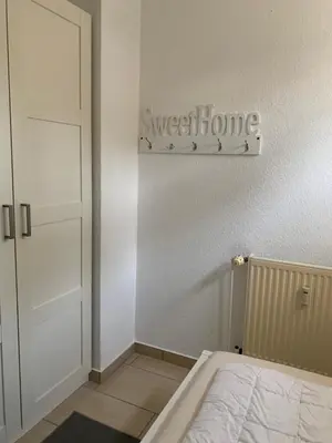 Ein Bett oder Betten in einem Zimmer der Unterkunft Fewo 2, Achtern Diek 3a Zingst