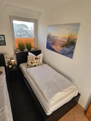Ein Bett oder Betten in einem Zimmer der Unterkunft Kapitänshaus - Wolkenstube