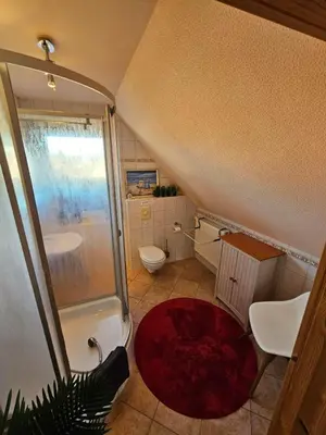 Ein Badezimmer in der Unterkunft Kapitänshaus - Wolkenstube