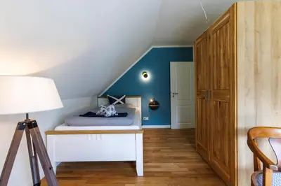 Ein Bett oder Betten in einem Zimmer der Unterkunft Haus Fuhlendorf