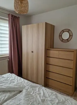 Ein Bett oder Betten in einem Zimmer der Unterkunft Bahnhofstr 11 Haus 2 Whg 3