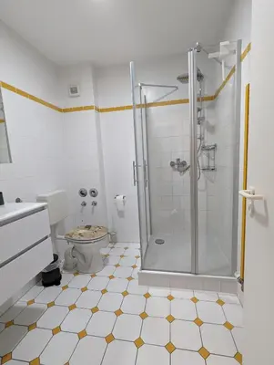 Ein Badezimmer in der Unterkunft Bahnhofstr 11 Haus 2 Whg 3