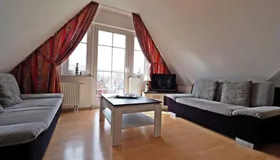 Ein Sitzbereich in der Unterkunft Ferienwohnung Genz Zingst