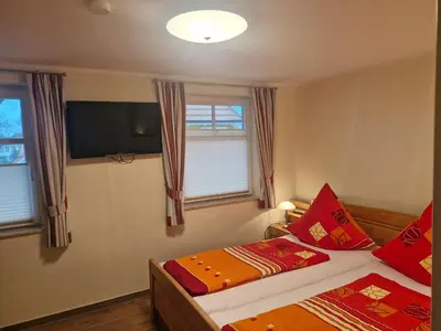 Ein Bett oder Betten in einem Zimmer der Unterkunft Rosenbergperle - 300m zum Strand