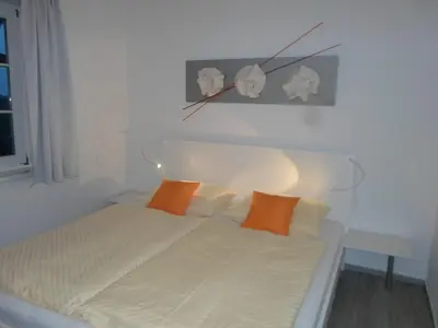 Ein Bett oder Betten in einem Zimmer der Unterkunft Jan und Jana Ferienhaus