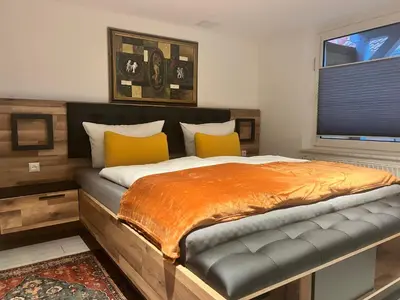 Ein Bett oder Betten in einem Zimmer der Unterkunft Wiesenau 2 Apartment in Prerow by Restaurant Wiesenau
