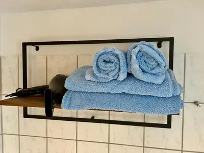Ein Bett oder Betten in einem Zimmer der Unterkunft Wiesenau 2 Apartment in Prerow by Restaurant Wiesenau