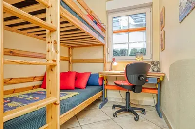 Ein Bett oder Betten in einem Zimmer der Unterkunft Hoppenberg 22 Whg 1