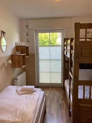 Ein Bett oder Betten in einem Zimmer der Unterkunft Seeblick 5