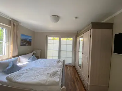 Ein Bett oder Betten in einem Zimmer der Unterkunft Seeblick 5