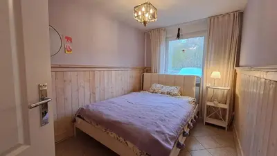 Ein Bett oder Betten in einem Zimmer der Unterkunft Ferienwohnung Astrid