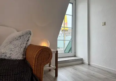 Ein Sitzbereich in der Unterkunft Küstenkoje Red Ferienwohnung mit Balkon in Prerow