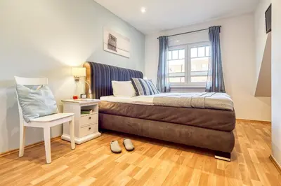 Ein Bett oder Betten in einem Zimmer der Unterkunft Haus Arielle