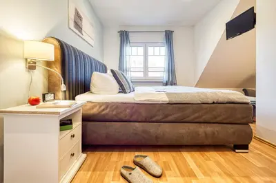 Ein Bett oder Betten in einem Zimmer der Unterkunft Haus Arielle
