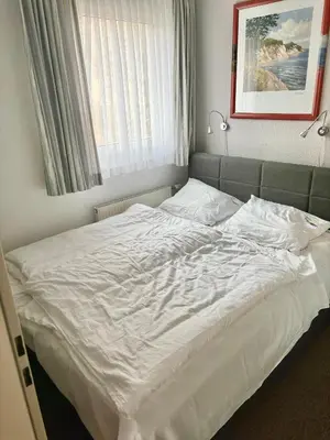 Ein Bett oder Betten in einem Zimmer der Unterkunft Apartment 