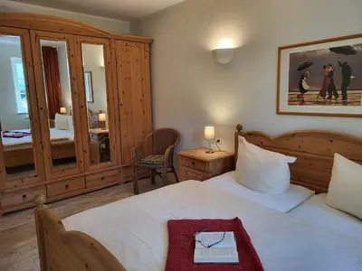 Ein Bett oder Betten in einem Zimmer der Unterkunft Ferienwohnung Vera