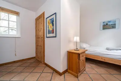 Ein Bett oder Betten in einem Zimmer der Unterkunft Ferienhaus Urlaubshus