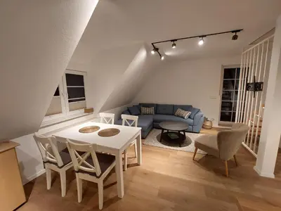 Ein Sitzbereich in der Unterkunft Neue Reihe 10 - moderne Ferienwohnung für 5 Personen