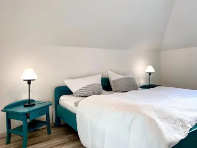 Ein Bett oder Betten in einem Zimmer der Unterkunft Hafenstraße 39 Wohnung 12