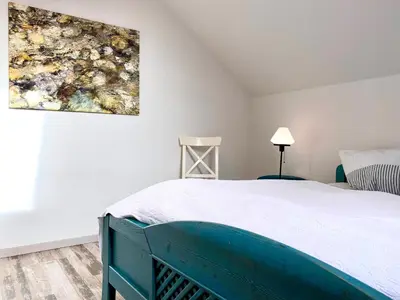 Ein Bett oder Betten in einem Zimmer der Unterkunft Hafenstraße 39 Wohnung 12