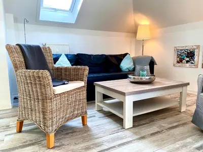 Ein Sitzbereich in der Unterkunft Hafenstraße 39 Wohnung 12