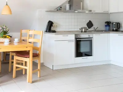 Küche/Küchenzeile in der Unterkunft Santa Karina - Maisonette mit Südwestbalkon