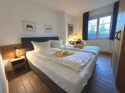Ein Bett oder Betten in einem Zimmer der Unterkunft Resi C2