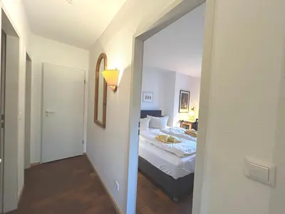 Ein Bett oder Betten in einem Zimmer der Unterkunft Resi C2
