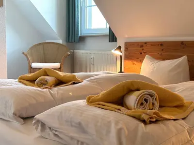 Ein Bett oder Betten in einem Zimmer der Unterkunft Resi I7