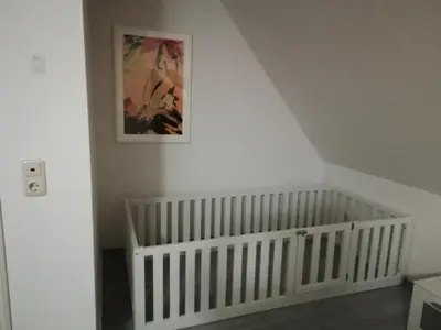 Ein Bett oder Betten in einem Zimmer der Unterkunft Gelbes Haus Pruchten - Ostseeurlaub bei Freunden