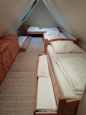 Ein Bett oder Betten in einem Zimmer der Unterkunft Gelbes Haus Pruchten - Ostseeurlaub bei Freunden