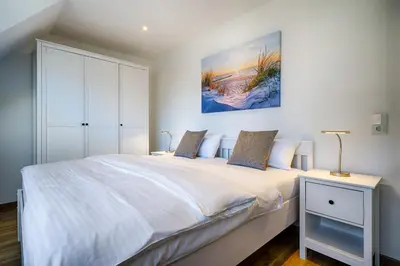 Ein Bett oder Betten in einem Zimmer der Unterkunft Mühlenpark 1 Mühlenpark Haus 5 Wo 19