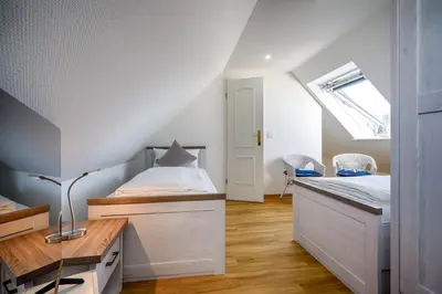 Ein Bett oder Betten in einem Zimmer der Unterkunft Mühlenpark 1 Mühlenpark Haus 5 Wo 19