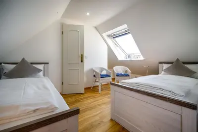 Ein Bett oder Betten in einem Zimmer der Unterkunft Mühlenpark 1 Mühlenpark Haus 5 Wo 19