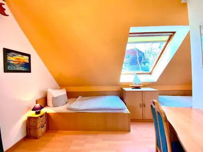 Ein Bett oder Betten in einem Zimmer der Unterkunft Am Deich 29