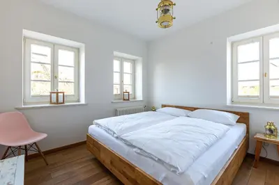 Ein Bett oder Betten in einem Zimmer der Unterkunft Käpt'ns Hus