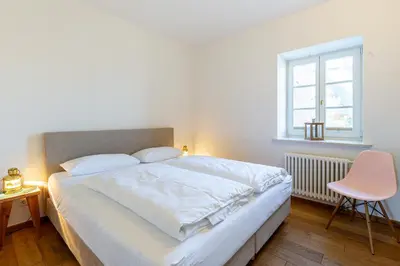 Ein Bett oder Betten in einem Zimmer der Unterkunft Käpt'ns Hus