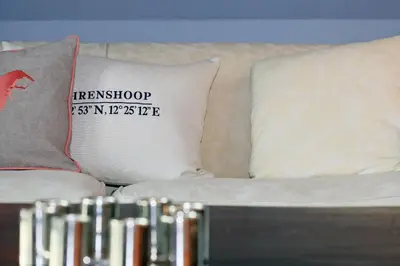 Ein Bett oder Betten in einem Zimmer der Unterkunft Ferienwohnung im Blauen Haus