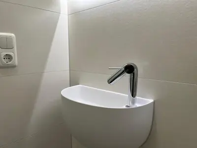 Ein Badezimmer in der Unterkunft Ferienwohnung im Blauen Haus